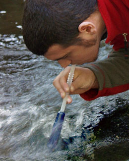 Aquamira Water Filter Straw in use